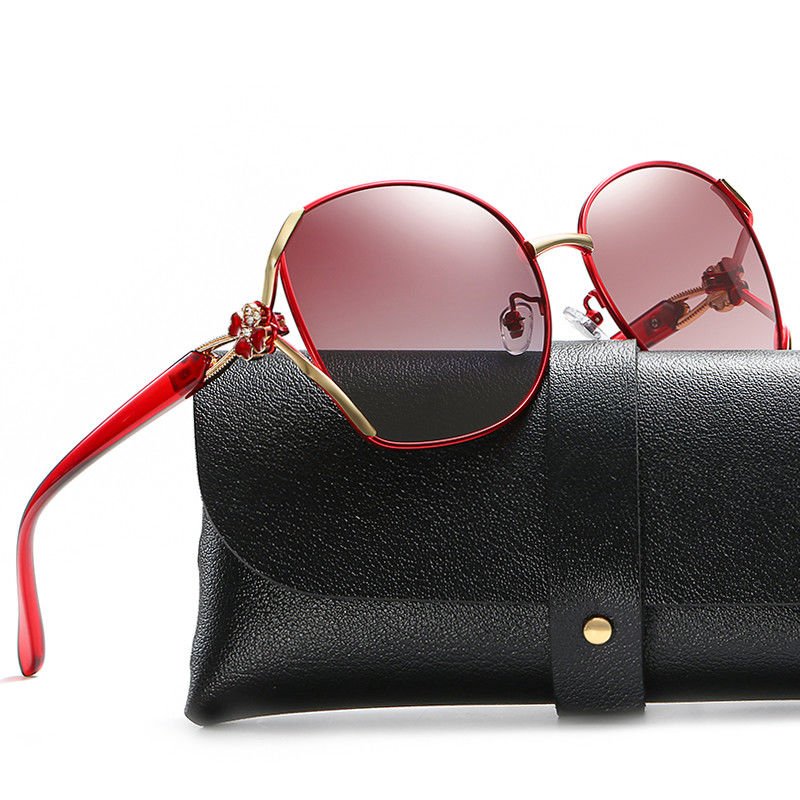 China Four Leaf Clover Elegant Glass Lens Metal Frame Polarized Sunglasses Diamond Studded company